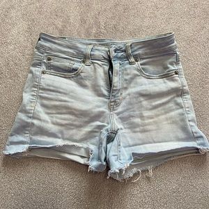 washed out blue jean shorts